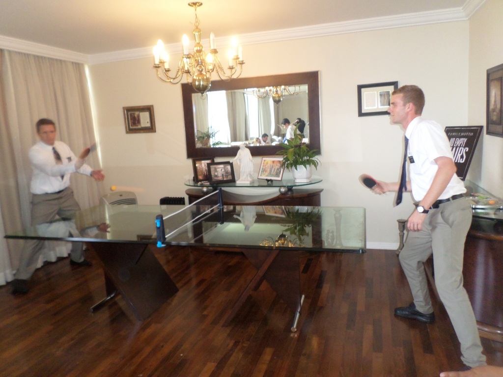 When we broke the mission record for baptisms in the month, President invited us over to his house to eat Dominos Pizza and play ping pong! It was a great time. Here is a picture of me playing against him (He destroyed me) 